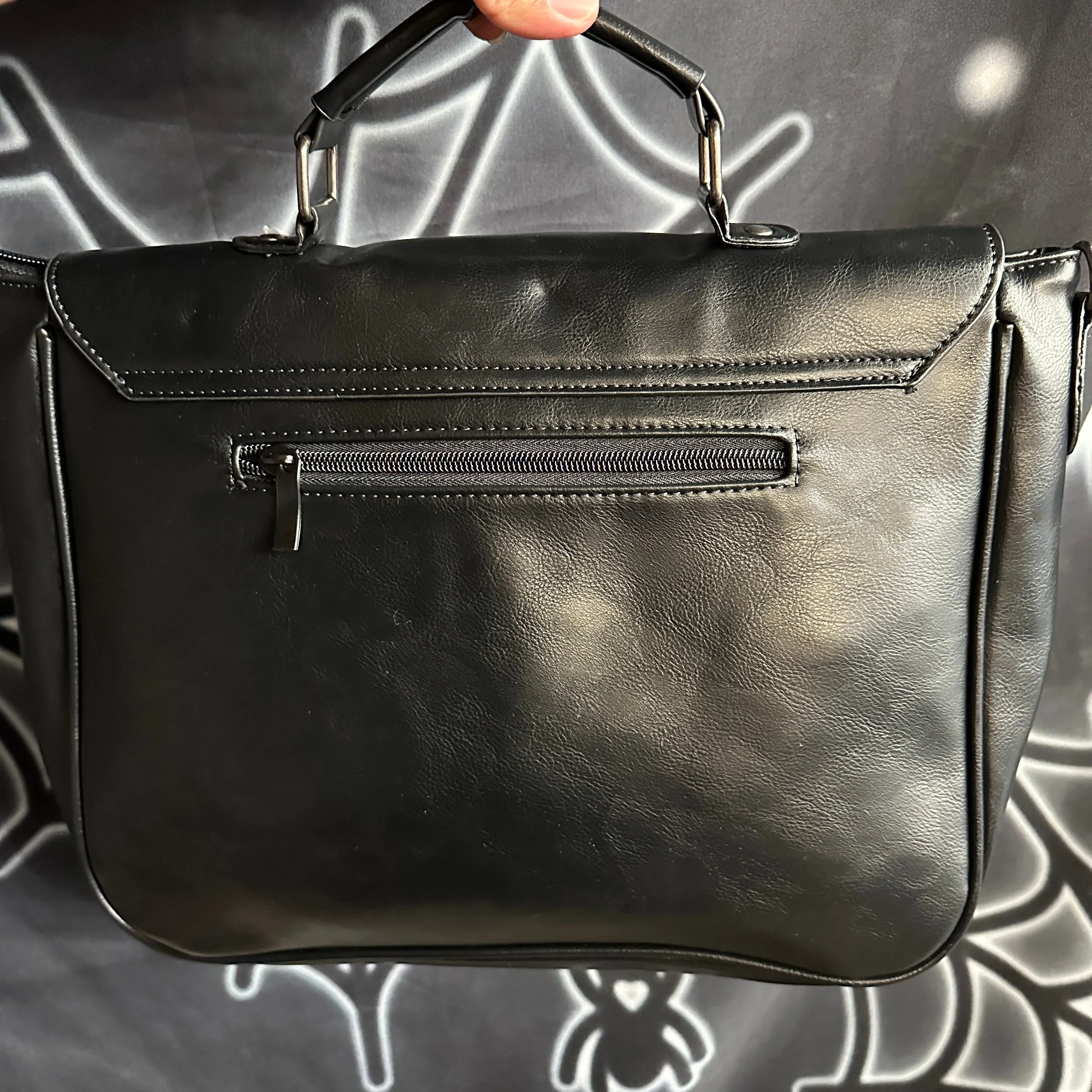 Embossed Twin Skull Satchel